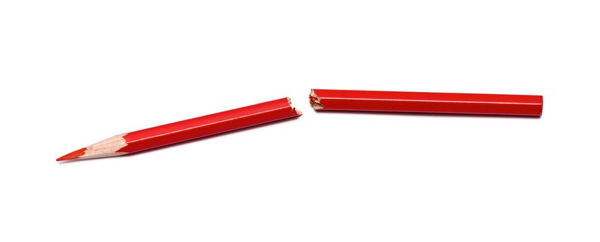 broken red pencil on a white background