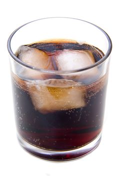 Glass of cola with ice on white background