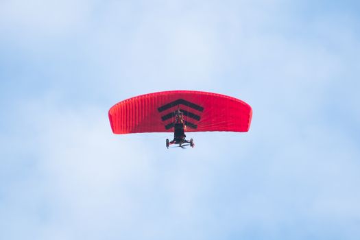 Paramotor in the blue sky