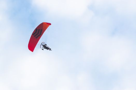 Paramotor in the blue sky