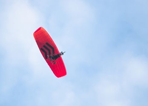 Paramotor in the blue sky