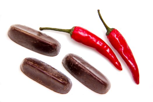 Chocolate with chili seen from above on white background