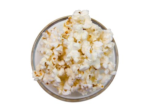 Popcorn on the bowl as seen from above on white background