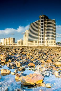 A View of Somerset West from the rocks during low tide.