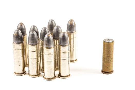 Think different (group of bullets and single bullet on white background)