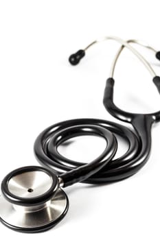 The black stethoscope on white background (isolated)