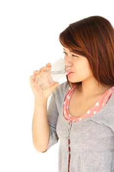 Thai lady is drinking water on white background(isolated) and blank area at left side