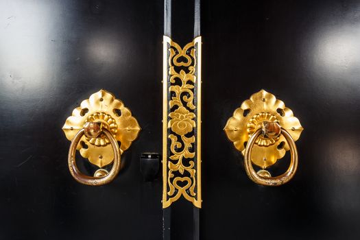 close up of door in asakusa temple with flower pattern at Tokyo , Japan