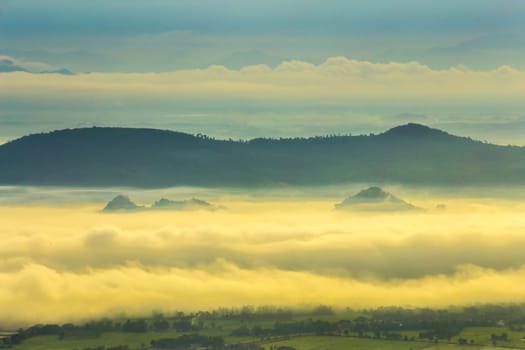 Sunrise over mountain with mist