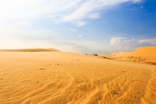 Wave on desert and blue sky at Mui Ne, South Vietnam