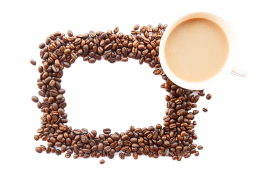 picture frame was created by coffee beans and cup on white background (isolated)