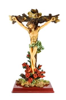 statue of jesus was transfixed on cross and rose at base on white background