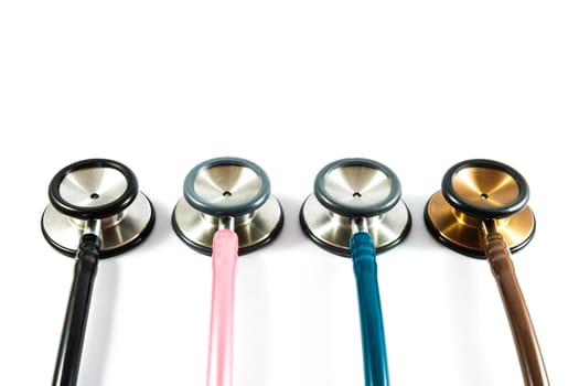 colorful stethoscopes line on white background (isolated) and blank area at upper side
