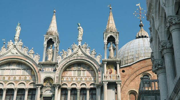 Sculptures and decoration of the Cathedral of San Marco in Venice on a sunny spring day