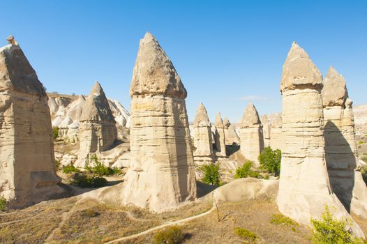 Fairy tale chimneys in Love Valley near Goreme, Cappadocia, Turkey