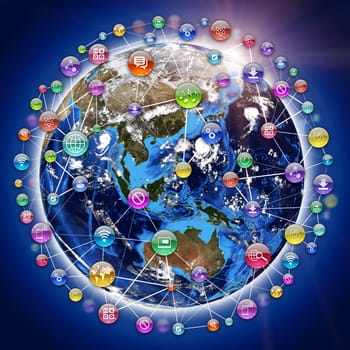 Earth, surrounded by sphere, composed of icons, connected by lines. On blue background. Element of this image furnished by NASA
