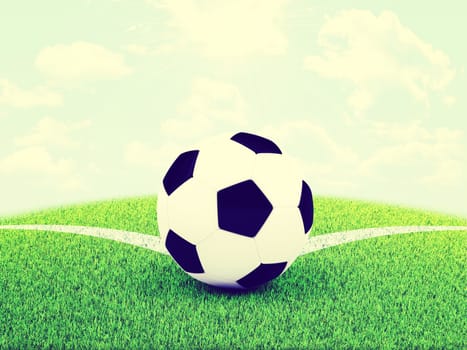 Soccer ball on a corner of the football field. Sky and clouds above