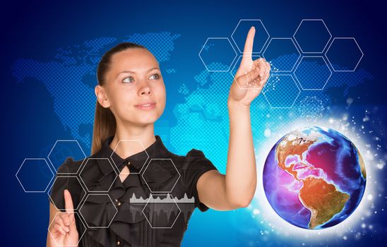 Beautiful woman in dress pointing on two blank icon cells, out of many. Globe beside. On blue background with world map. Element of this image furnished by NASA