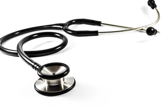 The black color stethoscope on white background