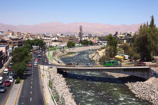AREQUIPA, PERU - AUGUST 23, 2014: View from Puente Grau (Grau Bridge) over the Chili River  and La Marina Avenue on August 23, 2014 in Arequipa, Peru. Arequipa is a popular travel destination.