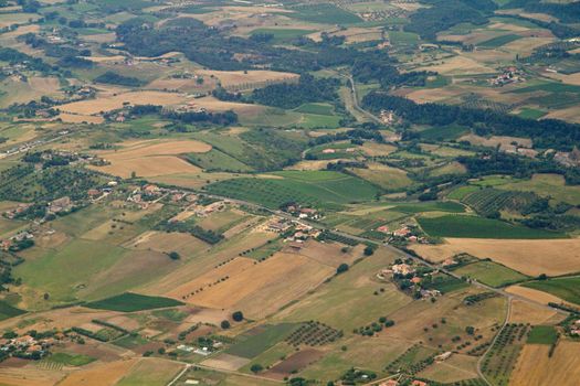 Photo shows Italian landscape taken from the plane.