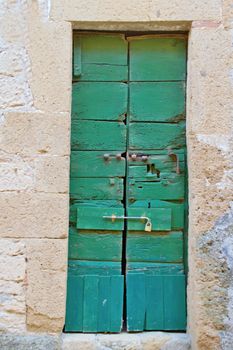 Photo shows a detail of the old Tuscany door.