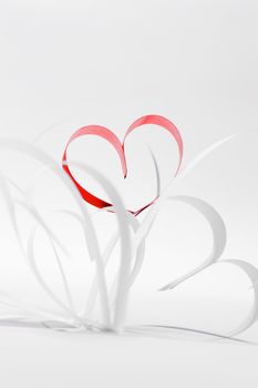 Paper ribbon hearts on white background, Valentines day concept