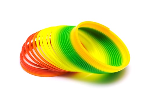 Colorful toy springs isolated on white