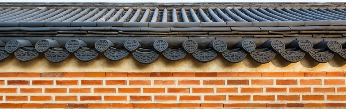 roof on wall in Gyeongbokgung palace ,Korea