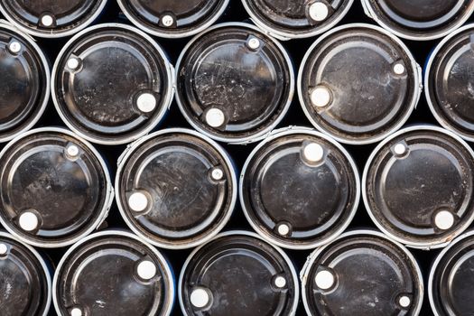 close up of black color oil barrels