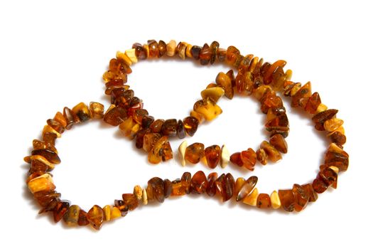 A beautiful amber necklace on white background