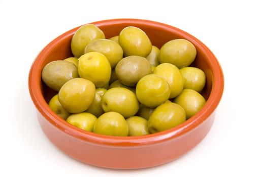 Olives on rustic bowl on white background