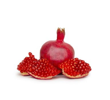 Pomegranate seeds on a white background.