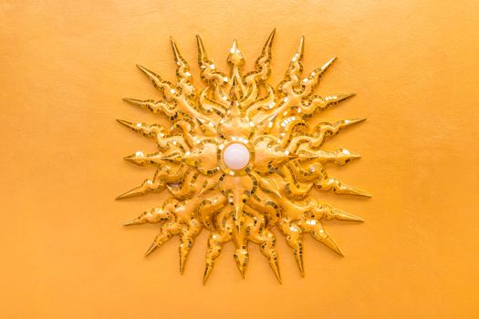 electric bulb was decorated to sun shape on ceiling at Wat Rong Khun ,Chiangrai ,Thailand