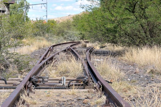 Unused railroad switch, also called turnout or points, next to the blockhouse in Beaufort West
