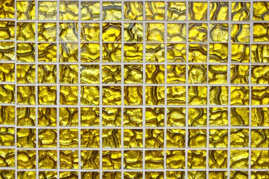 texture of yellow mosaic at swiming pool