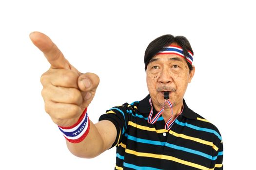 Thai man resist thai government (blow a whistle and wear wristband) on white background (isolated)