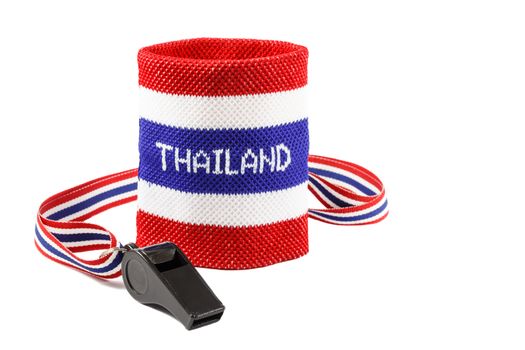 Whistle and wristband in thai flag pattern (symbol of resistance to thai government) on white background (isolated) and blank area at right side