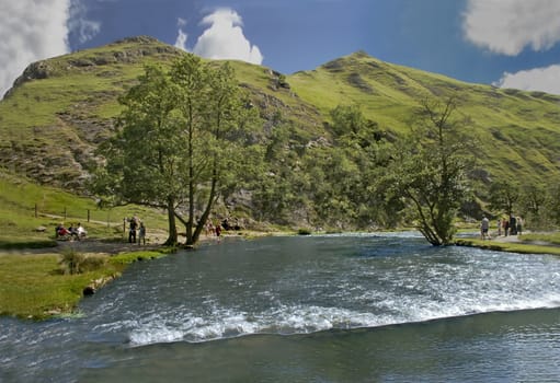 The river Dove at Dovedale marks the boundary btween Staffordshire and Derbyshire in the Peake District National Park in England.