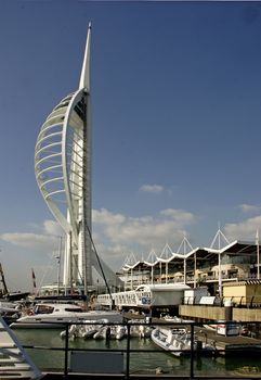 The Spinnaker Tower at Portsmouth, England stands near the sea front and harbour, not far from Nelsons flagship HMS Victory.