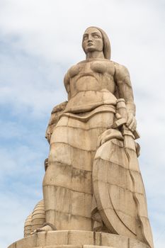 Statue of a woman with a sword and shield on one side and a serpent on the other, erected to commemorate those the Portuguese who died during the first world war Maputo, Mozambique