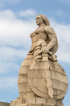 Statue of a woman with a sword and shield on one side and a serpent on the other, erected to commemorate those the Portuguese who died during the first world war Maputo, Mozambique