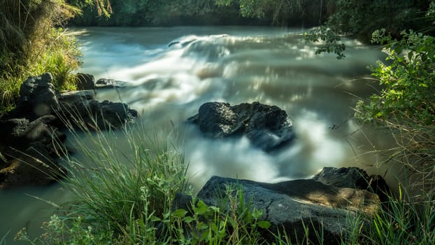 The Awash River flowing through the dense vegetation in the Rift Valley area of Ethiopia