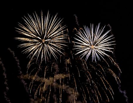 A close-up shot of sparkling Fireworks bursting out into beautiful shapes