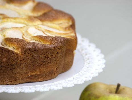 Homemade italian baked apple pie over a white table