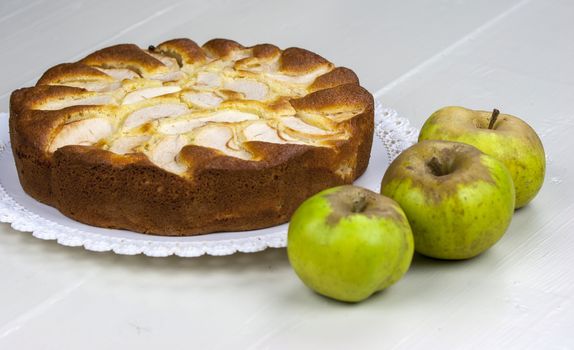 Homemade italian baked apple pie over a white table