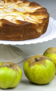Homemade italian baked apple pie over a white table