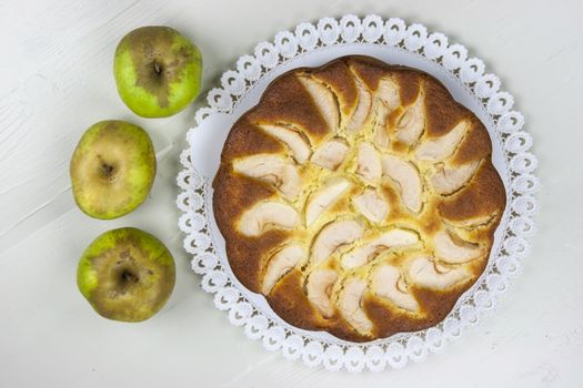 Homemade italian baked apple pie over a white table