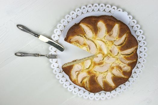 Homemade italian baked apple pie over a white table