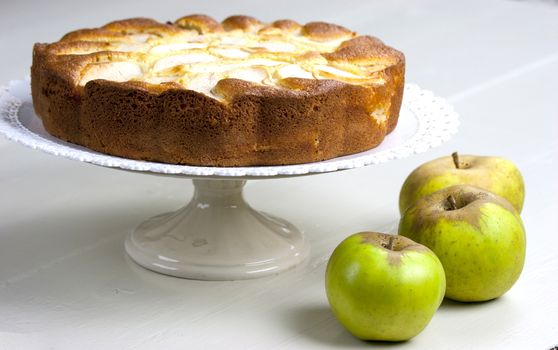 Homemade italian baked apple pie over a white table